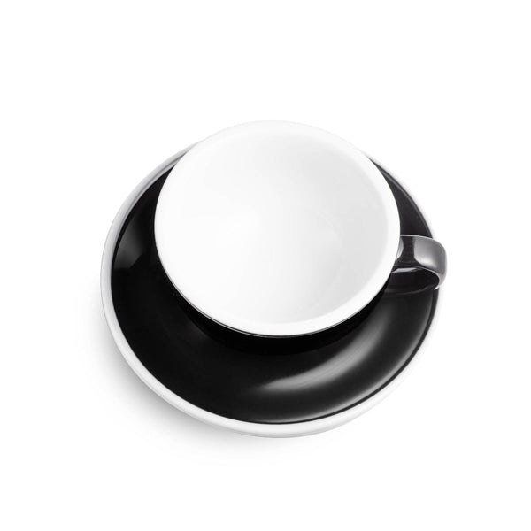 black egg shaped cappuccino cup and saucer