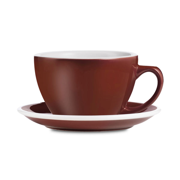 brown egg shaped latte cup and saucer