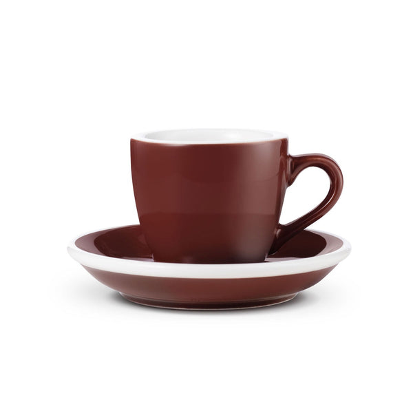 brown egg shaped espresso cup and saucer