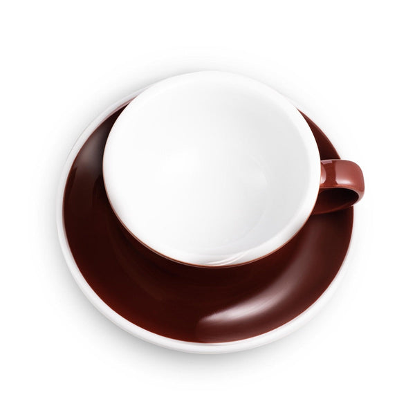 brown egg shaped latte cup and saucer