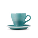 tulip shaped latte cup in teal with saucer