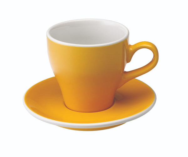 tulip shaped latte cup in yellow with saucer
