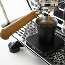 acaia umbra lunar scale black in use on an espresso machine