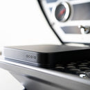 acaia umbra lunar scale black in use on an espresso machine