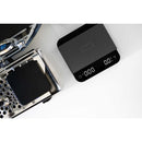 acaia umbra lunar scale black in use on an espresso machine