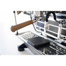 acaia umbra lunar scale black in use on an espresso machine