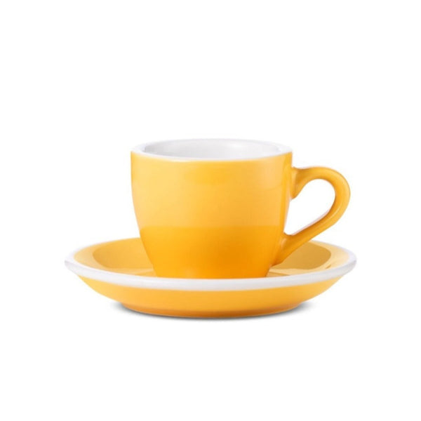 yellow egg shaped espresso cup and saucer