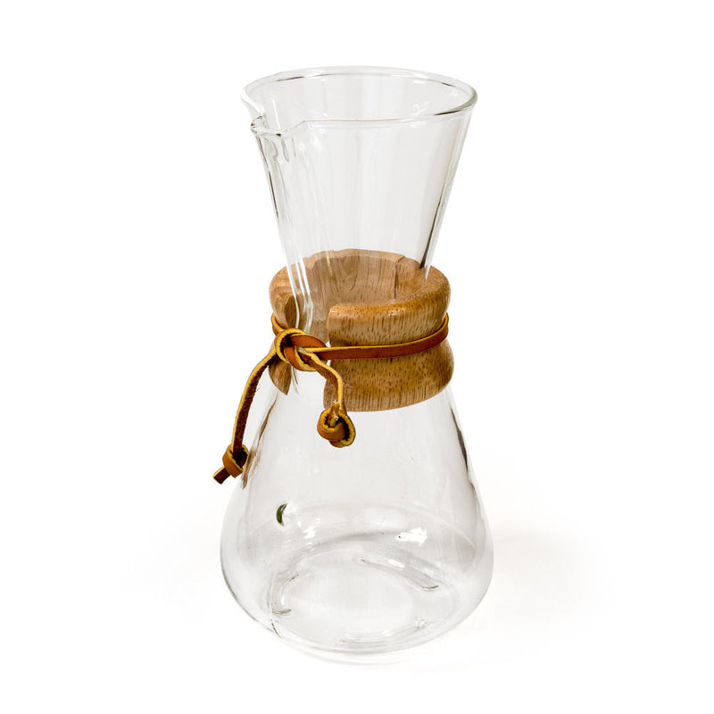 "Elevate your brewing with Chemex Classic Series 3 cup coffee brewer with original rawhide at Espresso Parts. Explore our selection for the perfect pour-over experience. Upgrade your coffee ritual today!"
