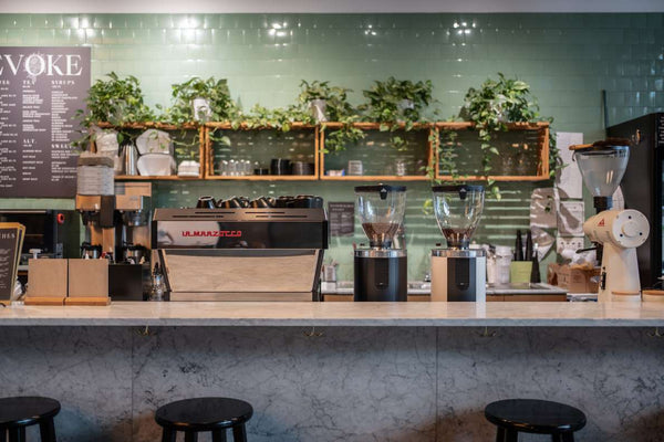 How many commercial grinders does a coffee shop need?