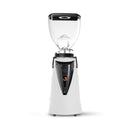 A commercial electric coffee grinder with a white base, black central housing, and a clear hopper on top, shown against a plain white background.