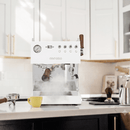 Espresso machine on a kitchen counter with a white cabinet background