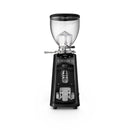 Black coffee grinder with clear top on a white background