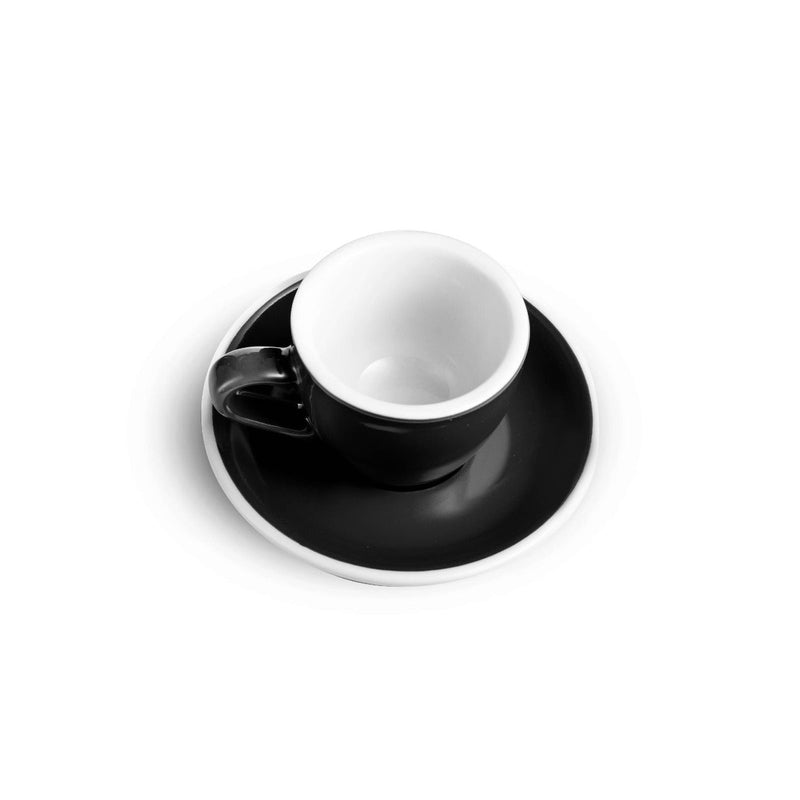 black egg shaped espresso cup and saucer
