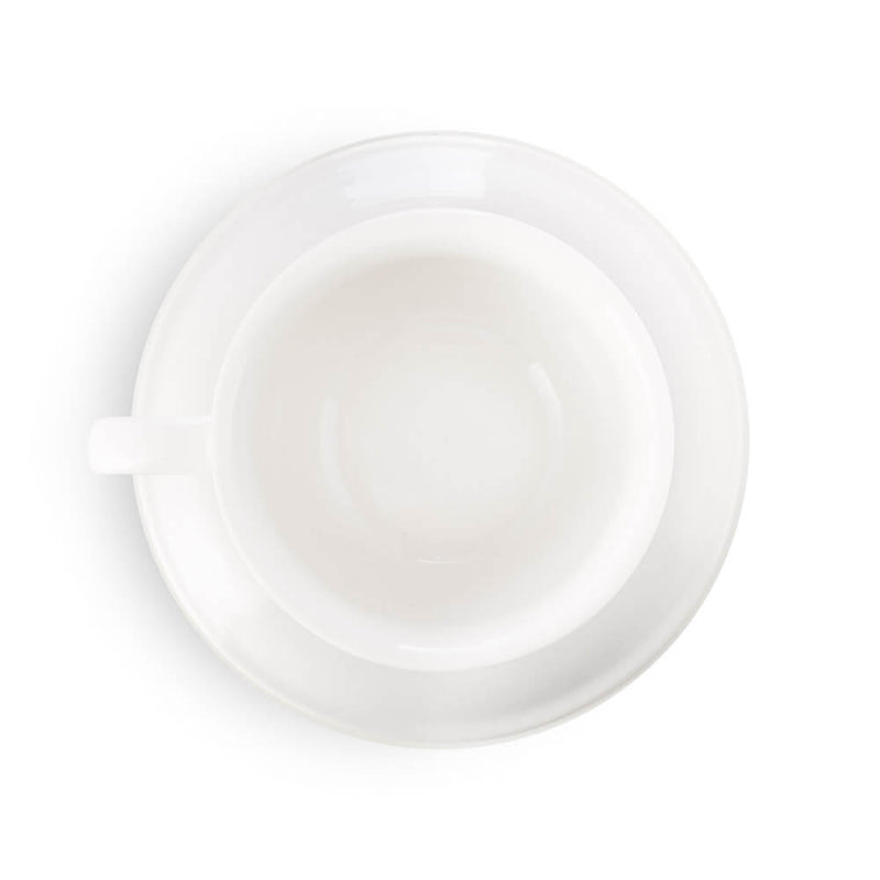 white cappiccuno cup and saucer