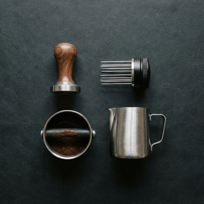barista tools showing tamper, wdt, knockbox and pitcher