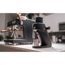 mahlkonig x64 sd single dose grinder in black with bellow next to ascaso baby t espresso machine