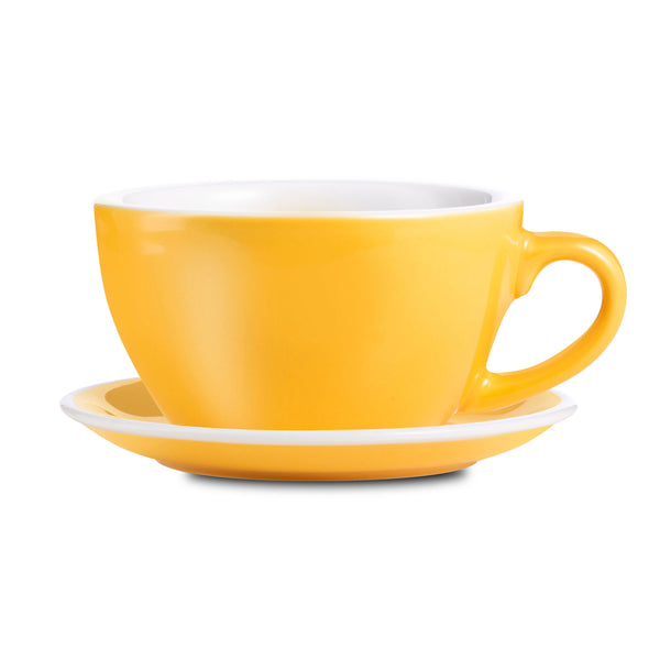 yellow egg shaped latte cup and saucer