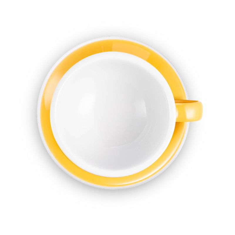 yellow egg shaped latte cup and saucer