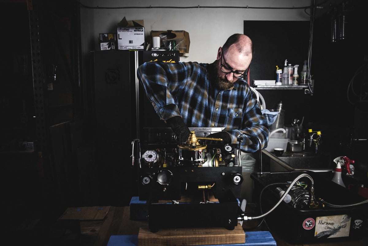On the bench in our Olympia shop, where we test, repair, and maintain the same machines we recommend, right down to the group head.